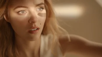 Chaumet Bee My Love commercial still of blonde girl staring into diamond light