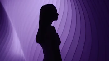 Silhouetted Amanda Seyfried in a purple Lancôme HCF Rénérgie world directed by Barnaby Roper