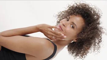 Vichy B3 Beauty Commercial still woman of african descent staring into camera directed by Barnaby Roper