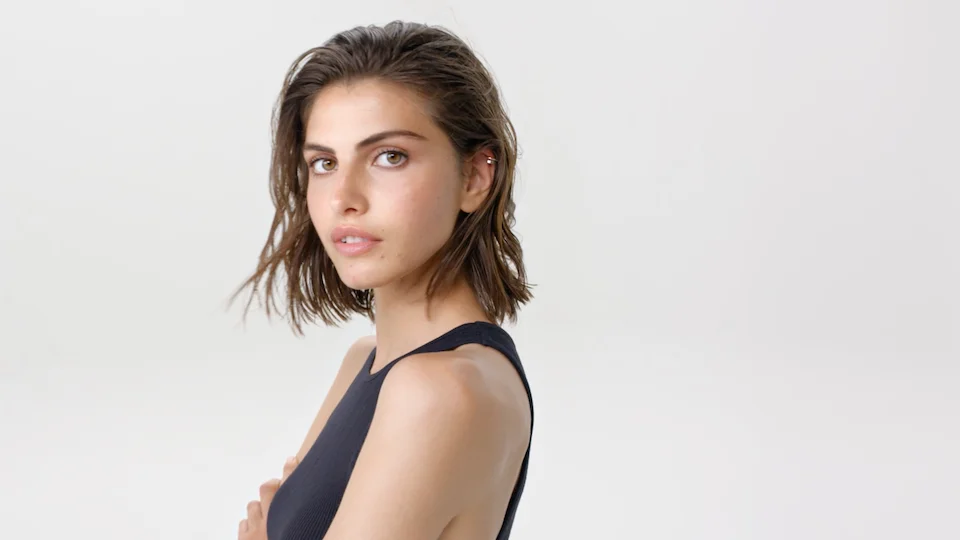 Normarderm skincare campaign color still of young female model staring into camera directed by Barnaby Roper